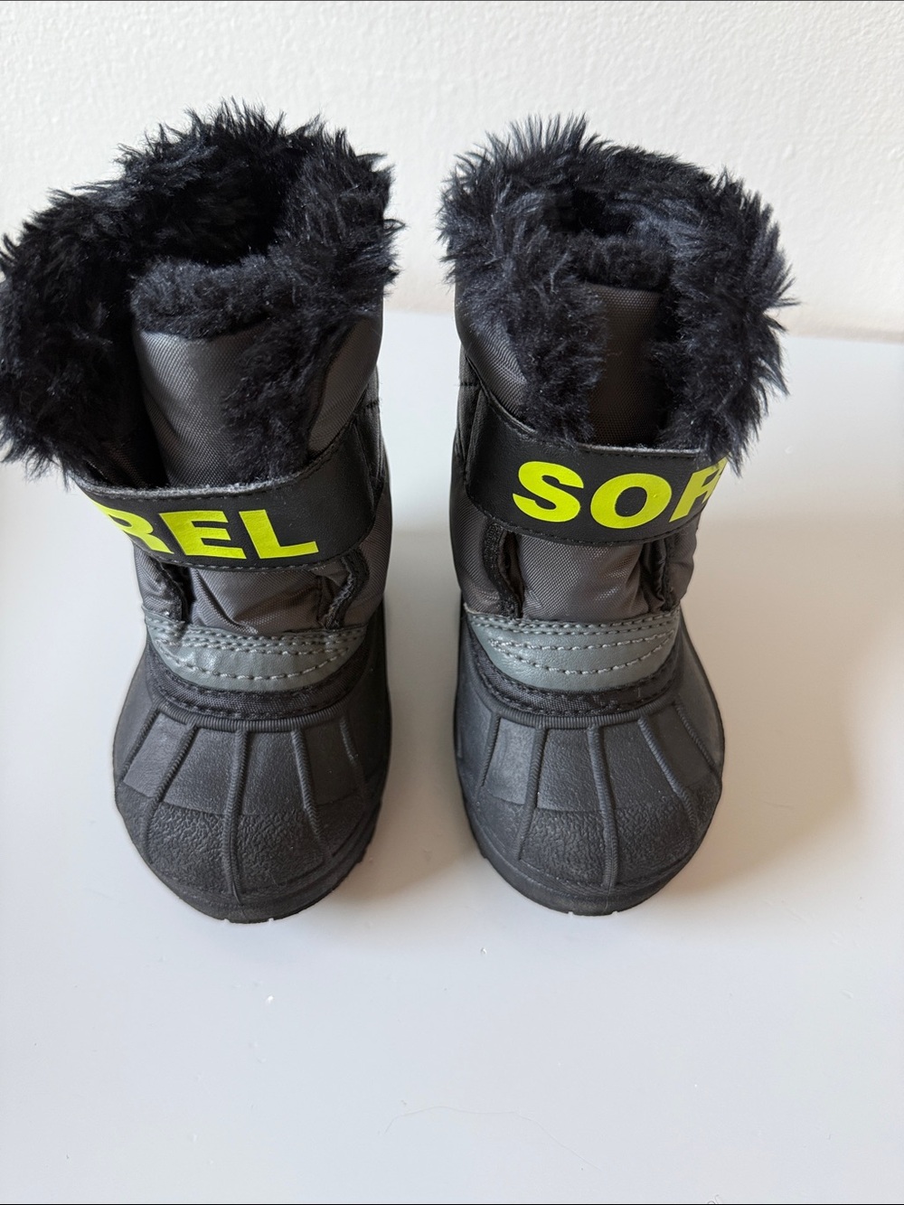 Sorel Kids Black Snow Boots with Yellow Logo